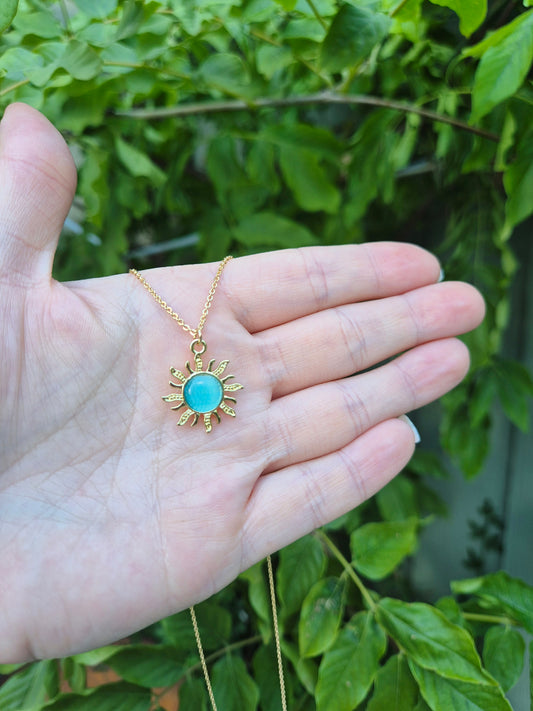 Blue sun charm necklace